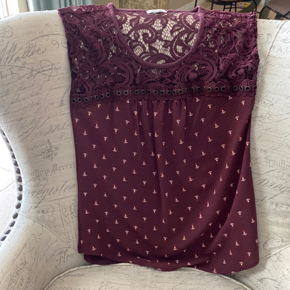 Maurice’s Size S maroon lace top with capped sleeves m.  Hangs nicely.Like new